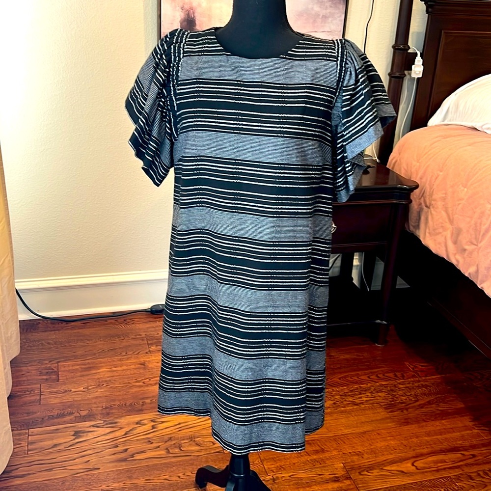 Black/white stripe dress with flutter sleeve. Boutique brand Moon River size XS